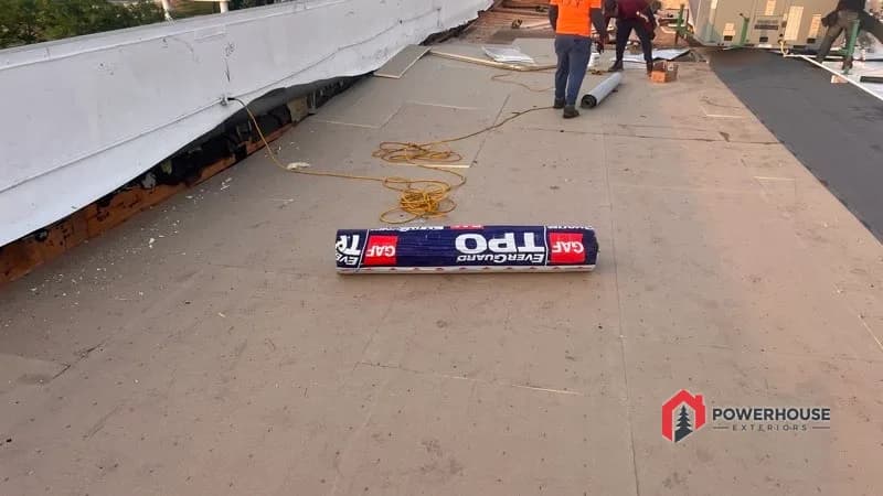GAF TPO membrane being installed across the commercial hotel roof