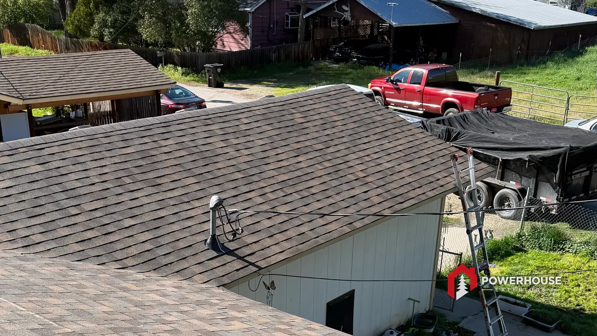 Completed roof replacement across the hip roof of a Boise foothills property