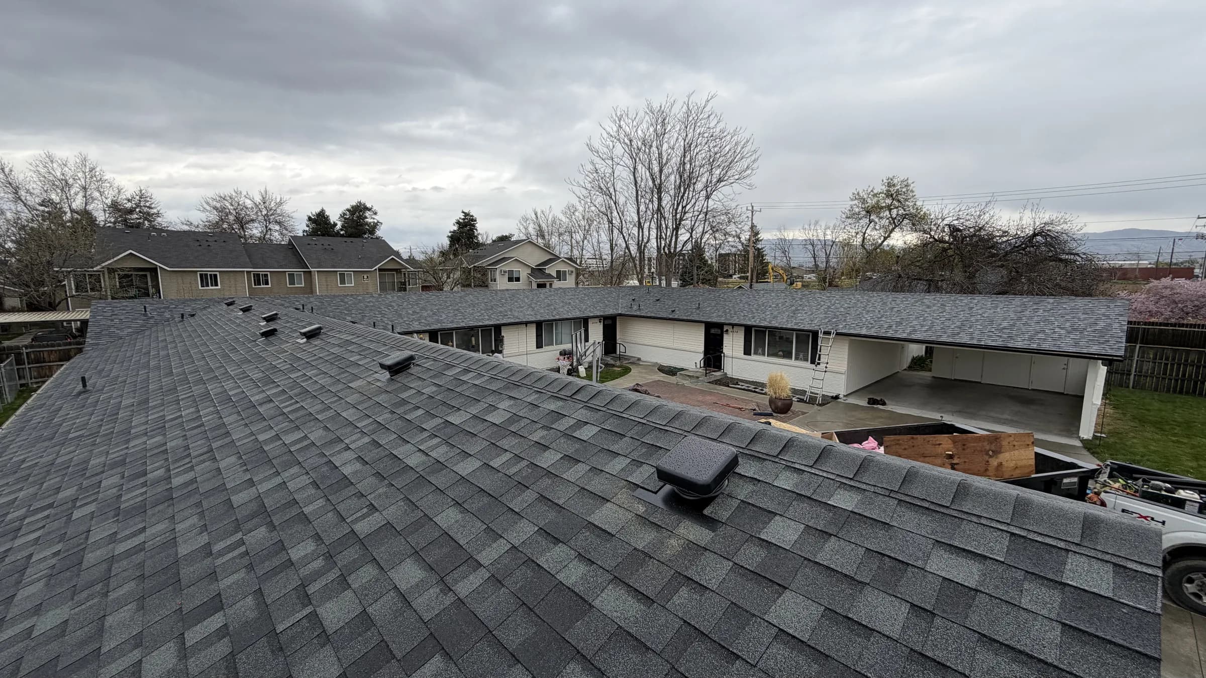 Completed architectural shingle roof across a Boise multifamily property