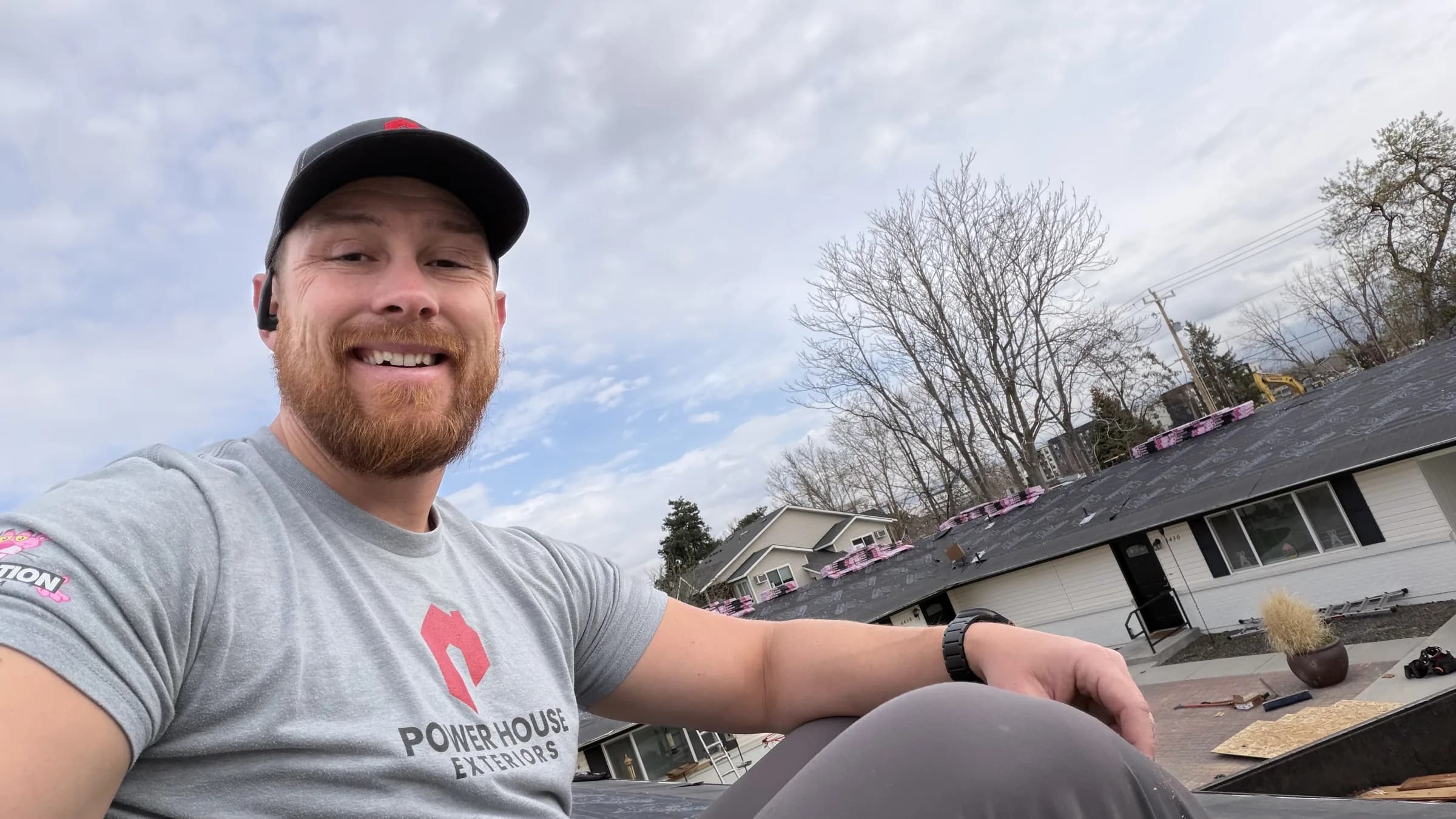 PowerHouse Exteriors team member at a Boise multifamily roofing project