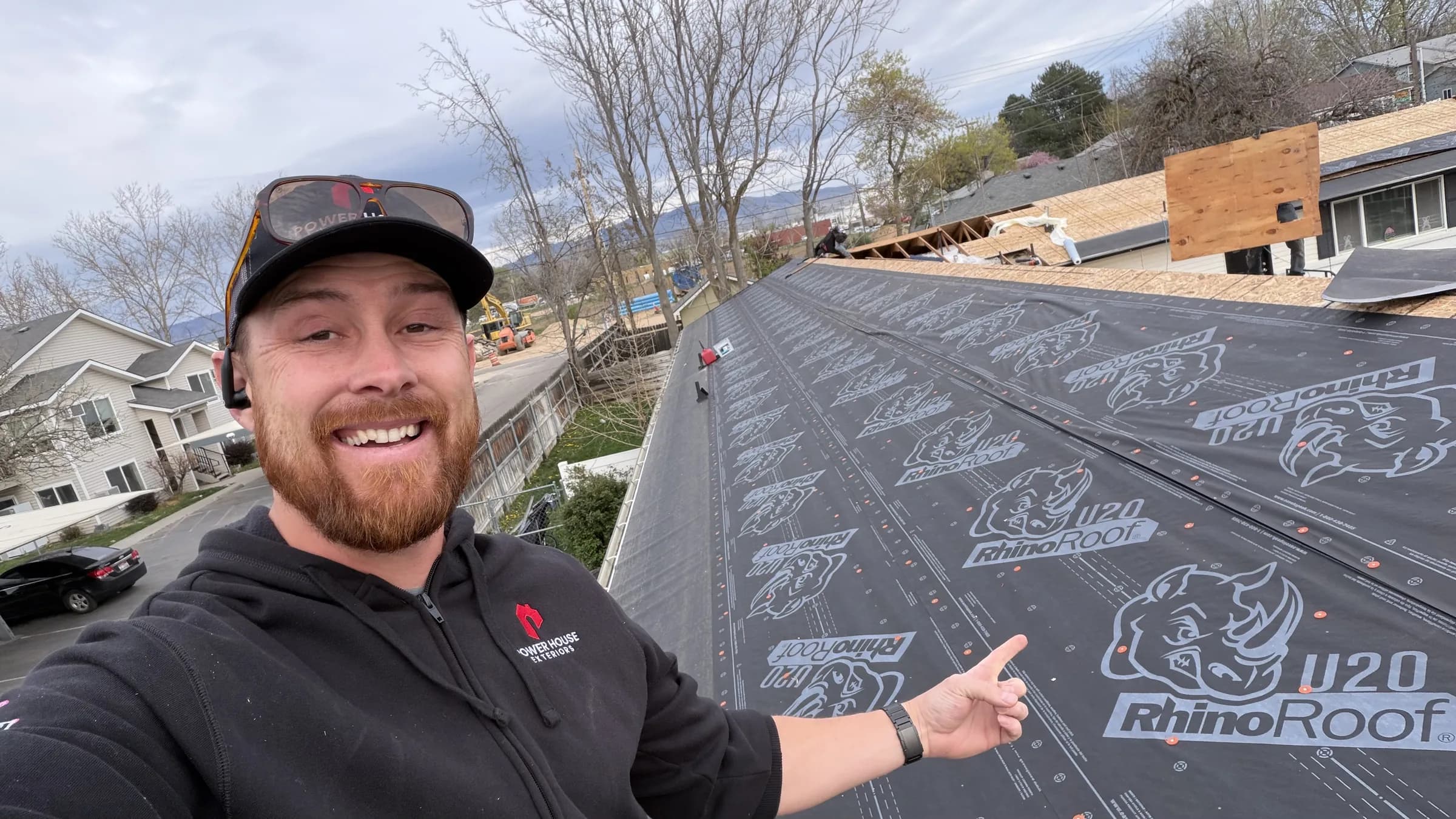 PowerHouse Exteriors team member documenting synthetic roof underlayment in Boise