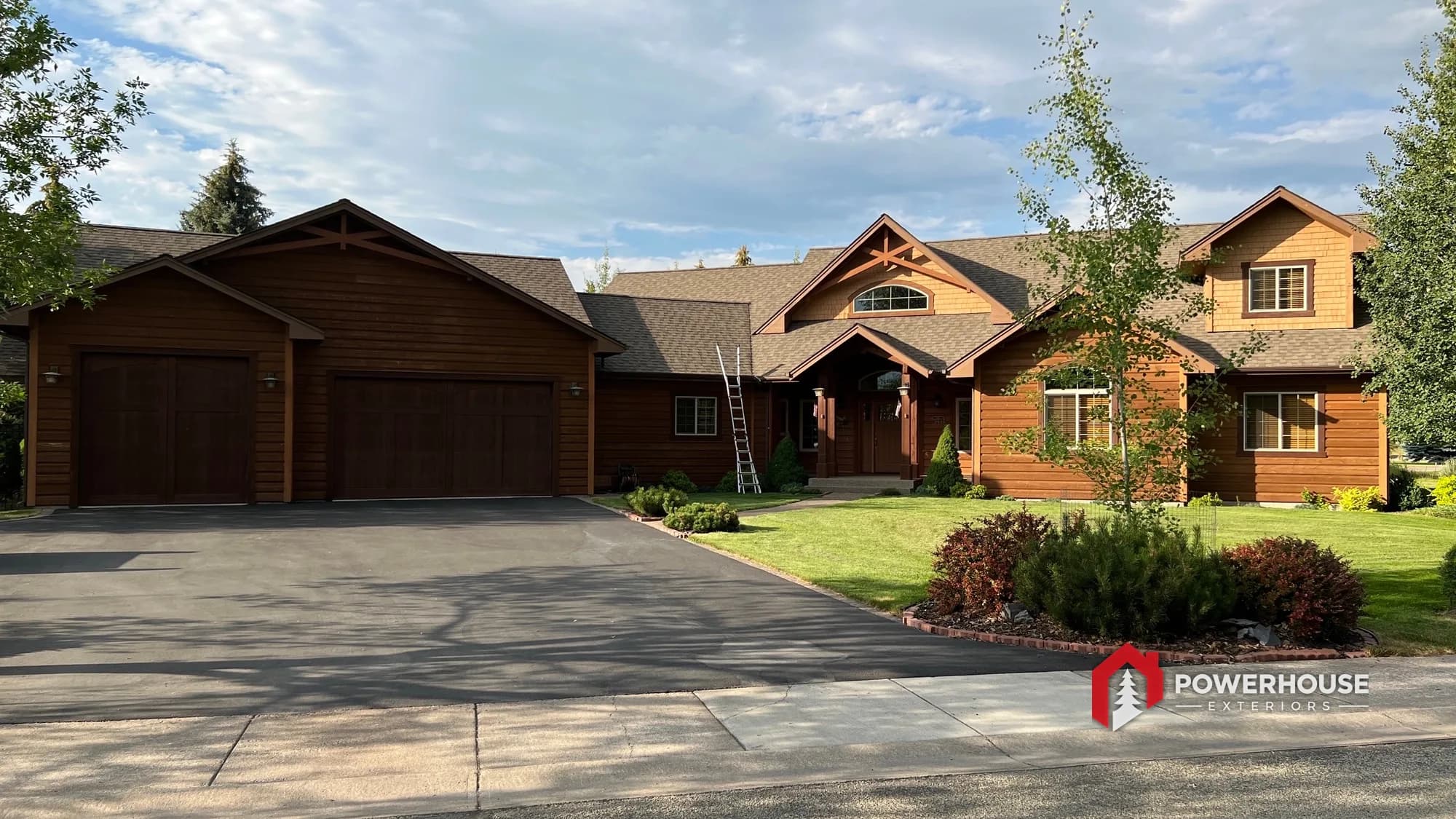 A completed craftsman home with a new impact-resistant roof in the HOA community