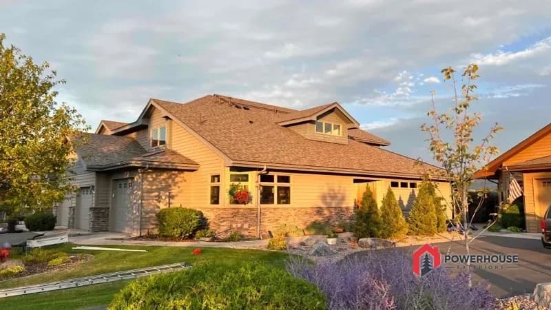 Completed impact-resistant shingle roof on a craftsman home in the lakeside HOA community