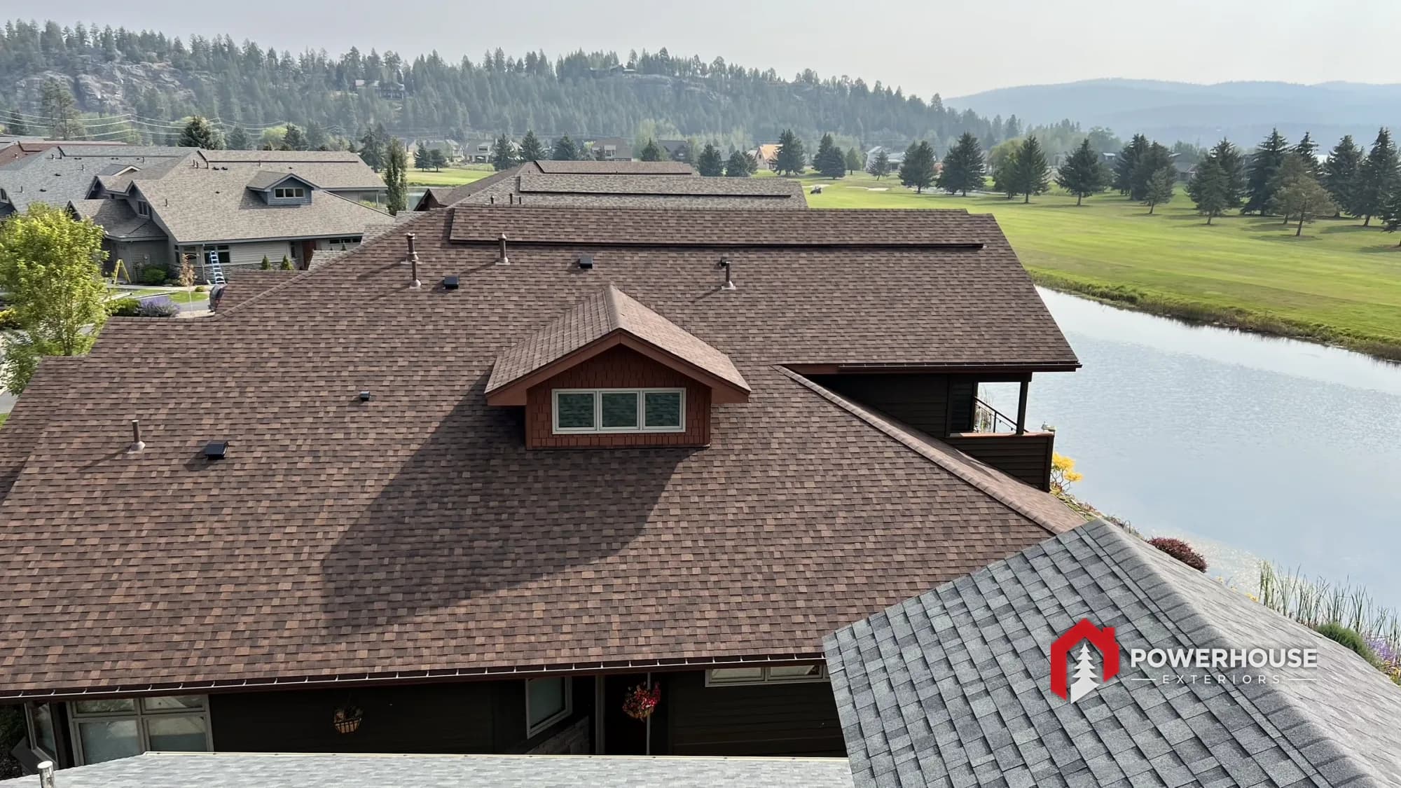 Completed impact-resistant HOA roofing, ridge detail, at a Lakeview property in Montana.