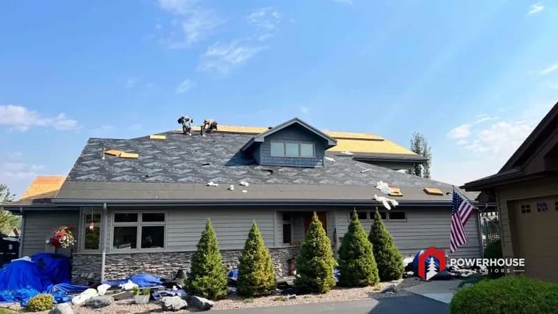 HOA community roof during tear-off before its impact-resistant shingle replacement