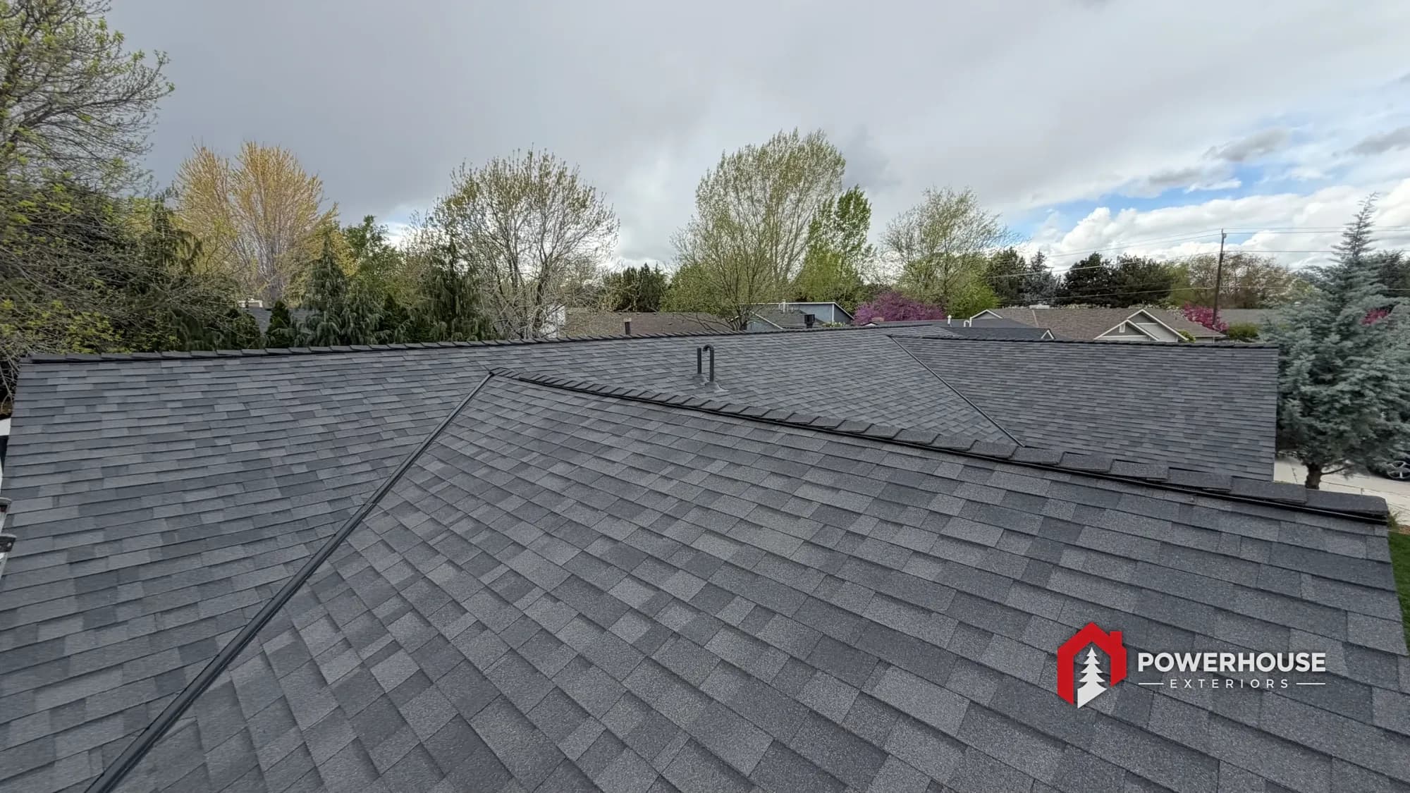 Completed asphalt shingle roof replacement on a Treasure Valley home by PowerHouse Exteriors.