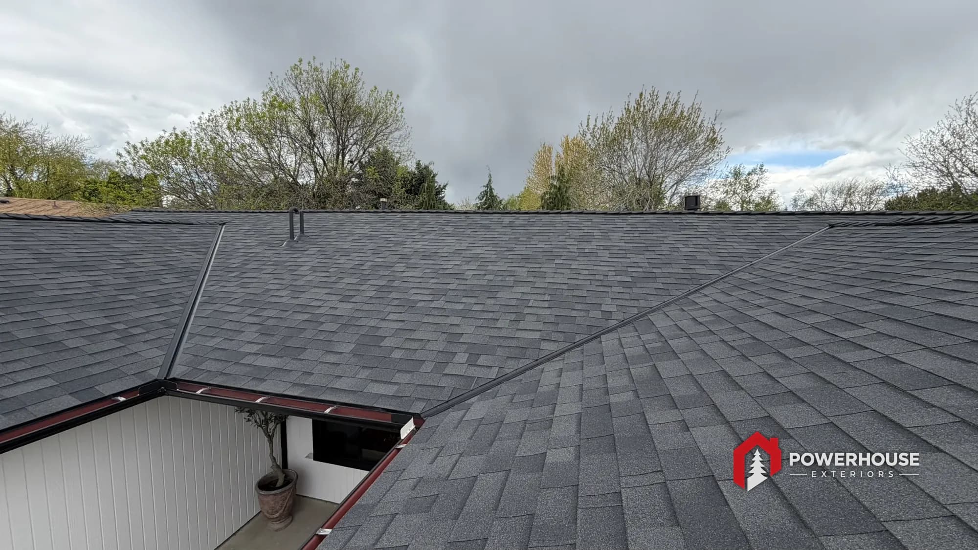 Completed asphalt shingle roof replacement on a Treasure Valley home by PowerHouse Exteriors.
