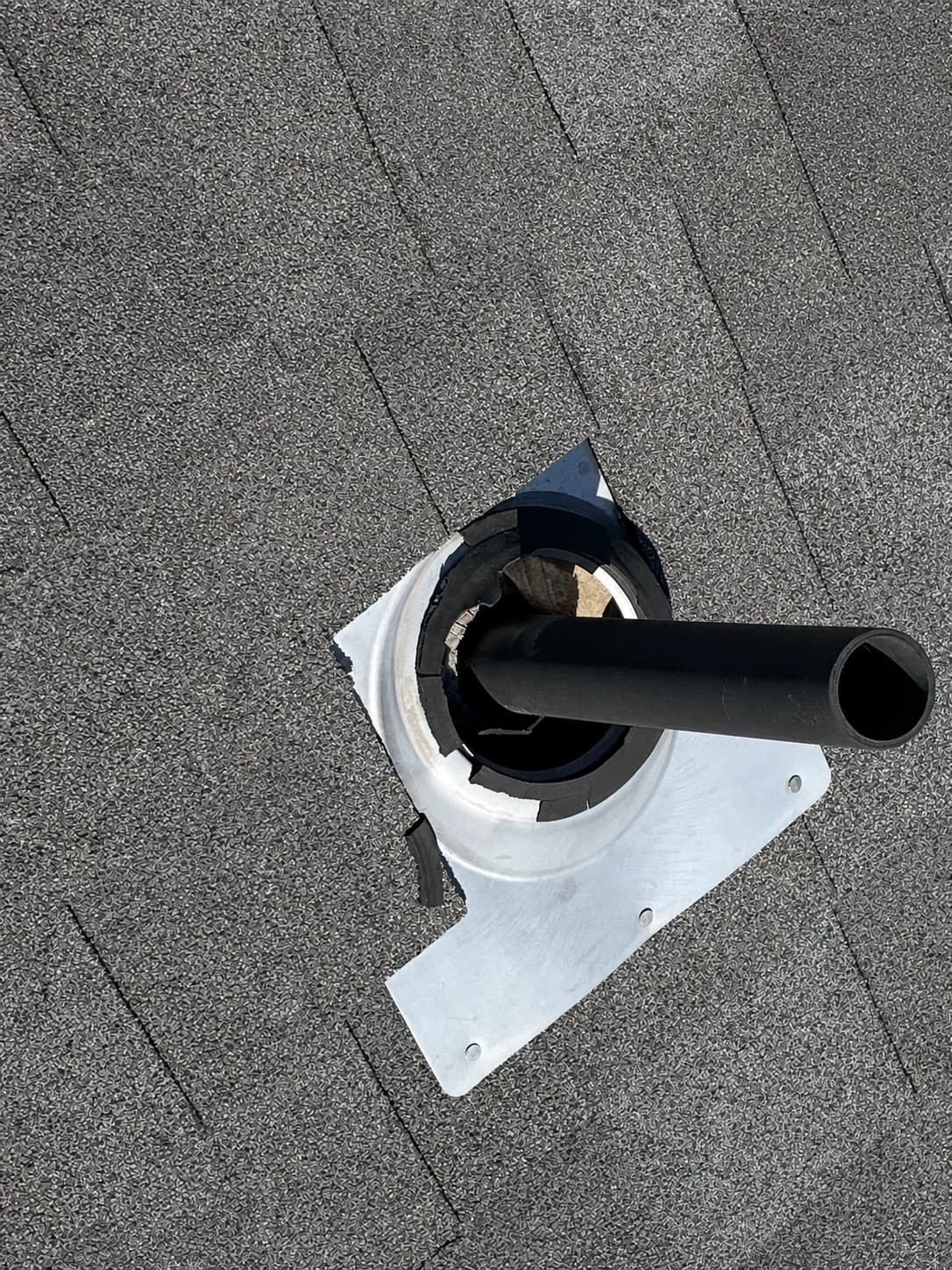 Treasure Valley Roof Pipe Boot Flashing Repair Exposed roof pipe boot and flashing prepared for repair on a Treasure Valley home.